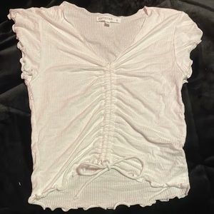 plan white shirt (a little see threw). strings are adjustable